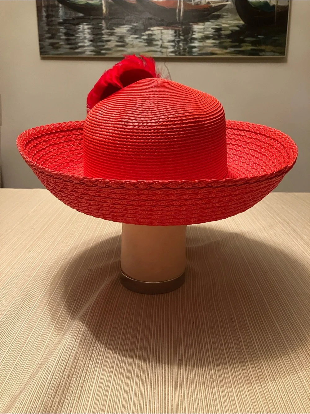 Red Straw Wide-Brimmed Hat with Black Velvet Floral and Red Feather Accents